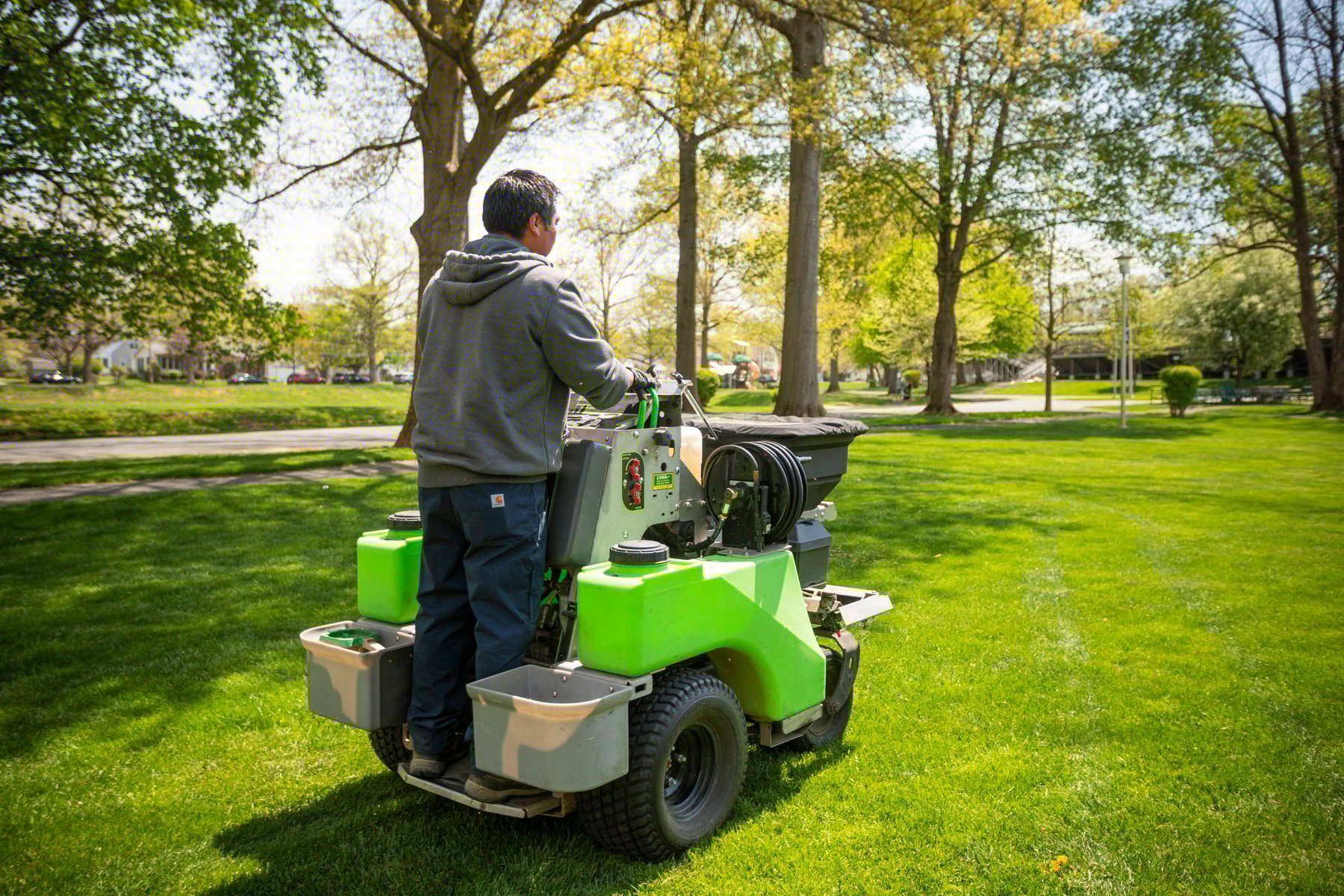 Commercial lawn care technician spreader limestone 3