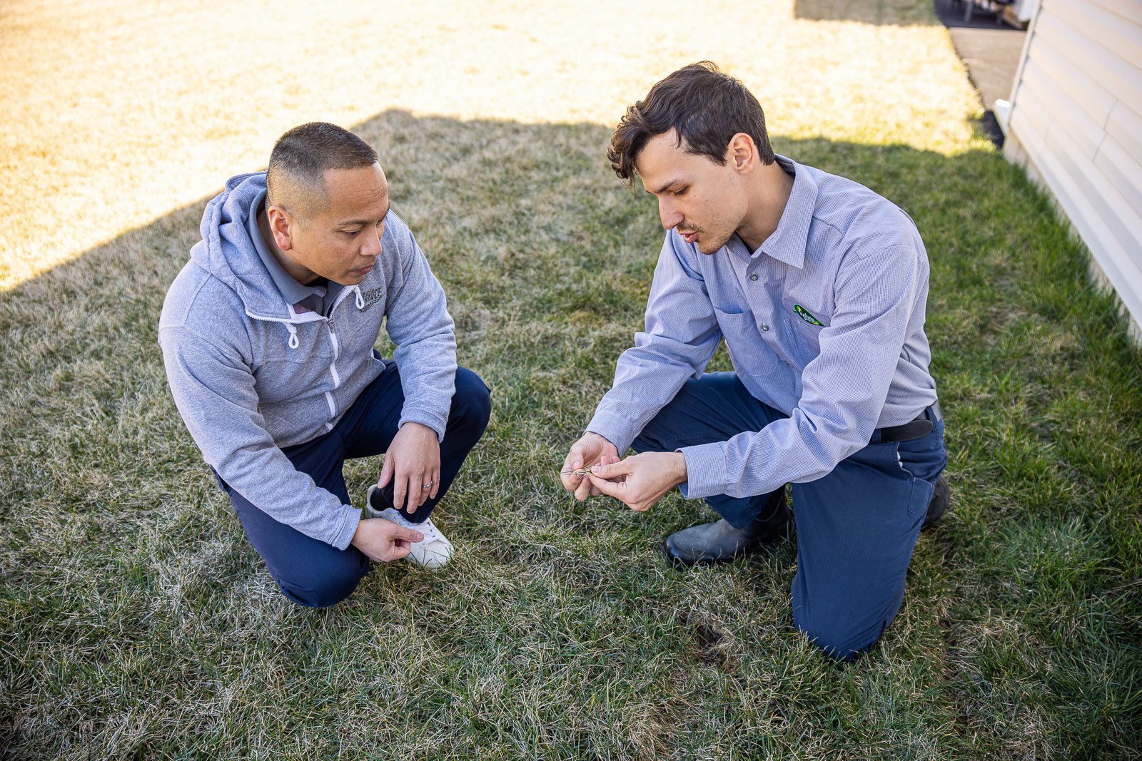 lawn care technician customer lawn inspection 18