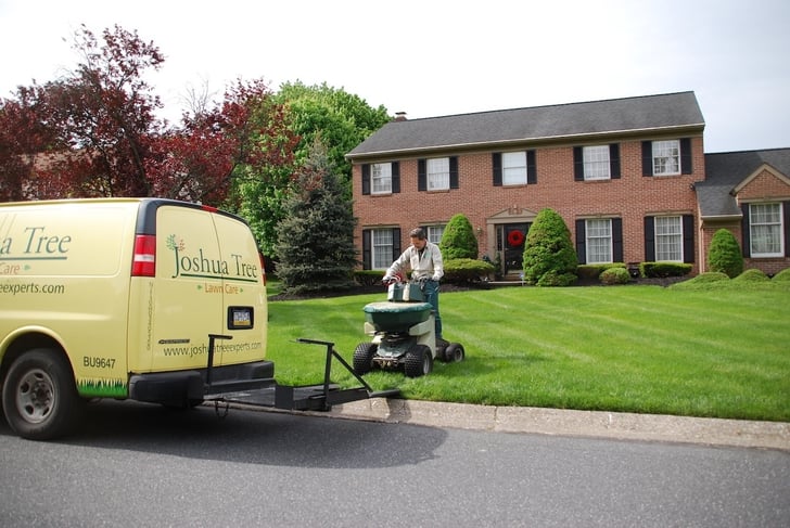 Joshua Tree lawn care technician and truck