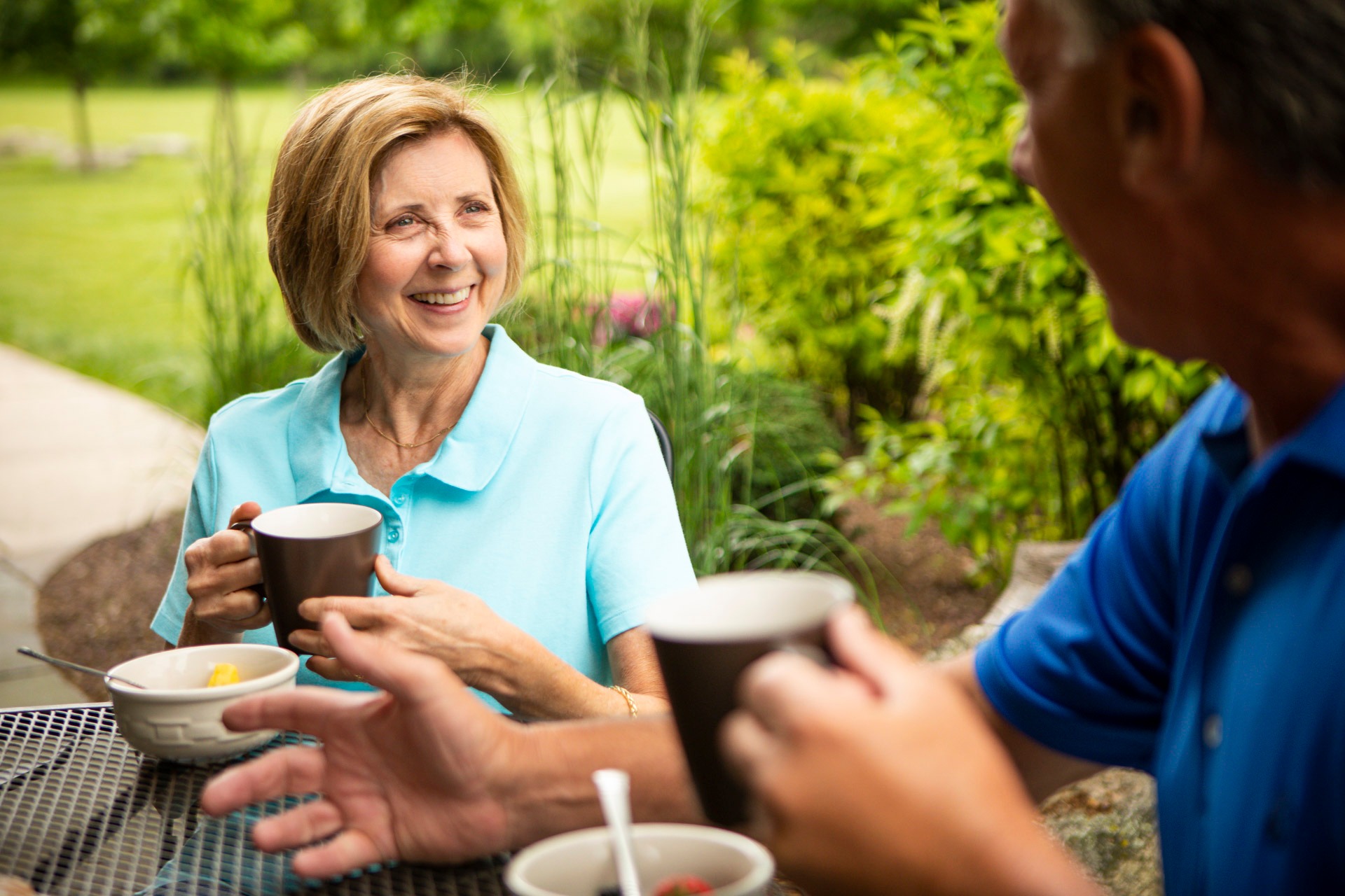 family enjoying healthy lawn